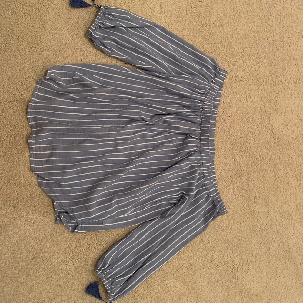 Off the should striped blue top!!